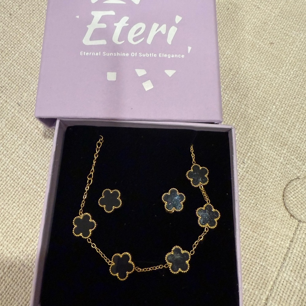 Gold and Black Clover bracelet set